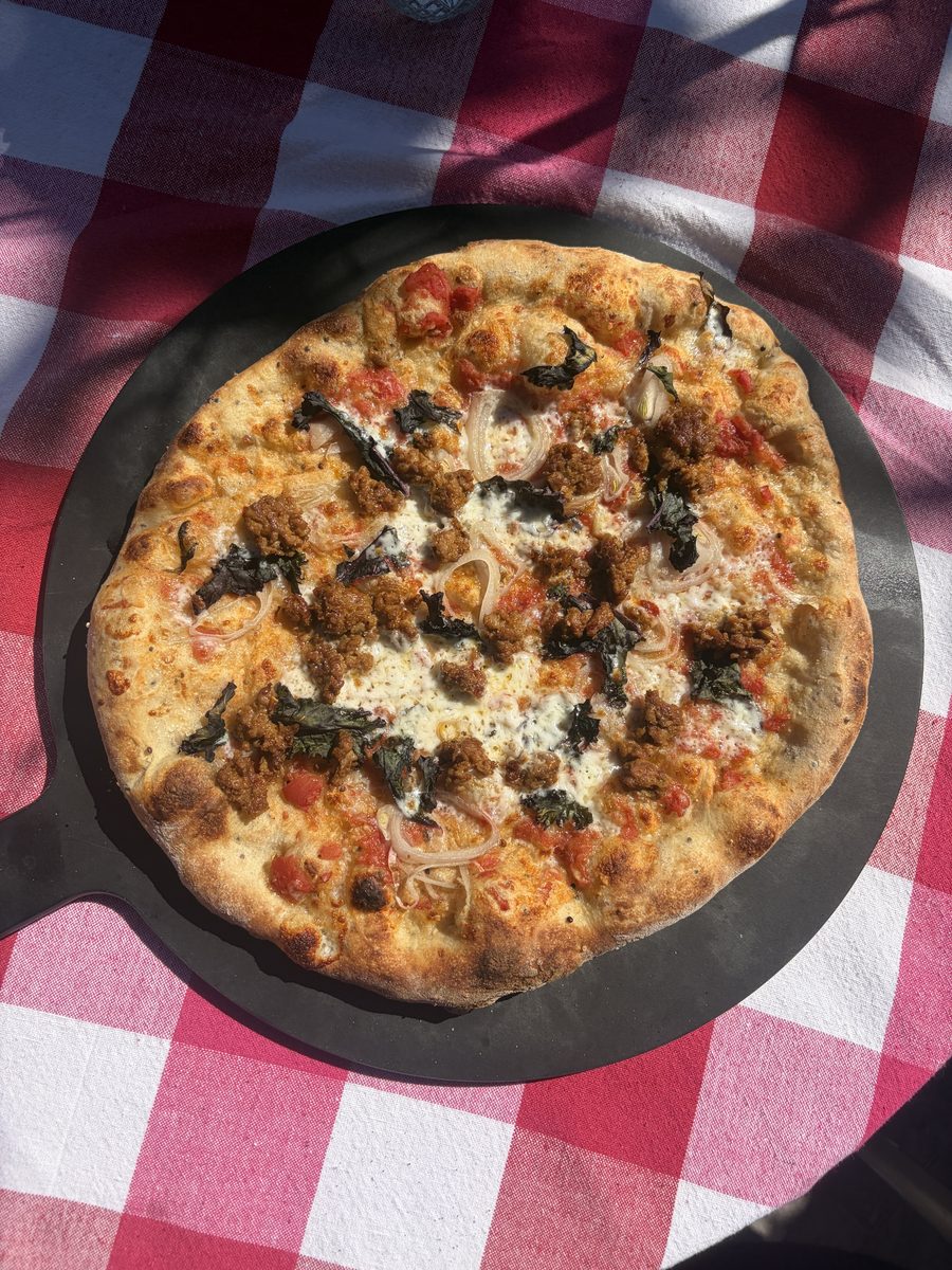 Sausage and kale pizza